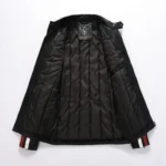 Open front view of a men's black sheepskin leather motorcycle jacket, revealing the quilted lining.