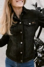 Close-up of women denim motorcycle jacket material