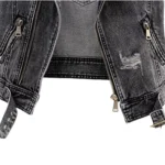 Close-up of denim biker vest material