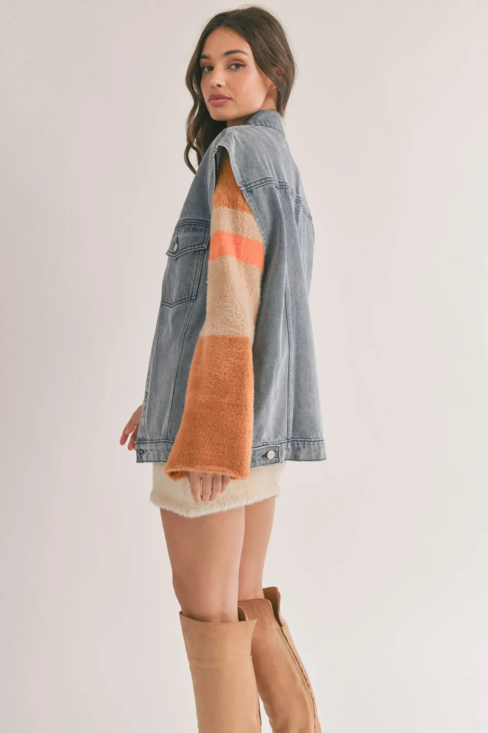 Oversized denim vest side view