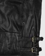 Close-up of the waist belt on a men's black motorcycle leather jacket.