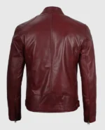 Men's maroon cafe racer leather jacket with a clean back design and ribbed cuffs.