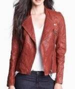 Fifty Shades of Grey Dakota Johnson brown leather jacket with quilted front and sleeves.