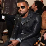 Kanye West wearing the black leather biker jacket, paired with jeans and a T-shirt.