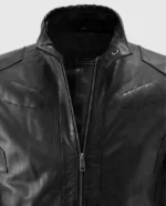 Right side view of a men's black cafe racer leather jacket, highlighting the side zipper pockets and quilted sleeves.