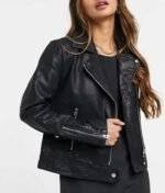 Riverdale Toni Topaz black leather biker jacket with zipper front and lapel collar.