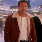 Ryan Reynolds wearing the Spirited red leather jacket in a promotional image.