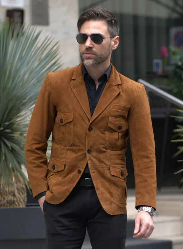 "Model wearing tan suede leather blazer front view, styled for a sophisticated look."