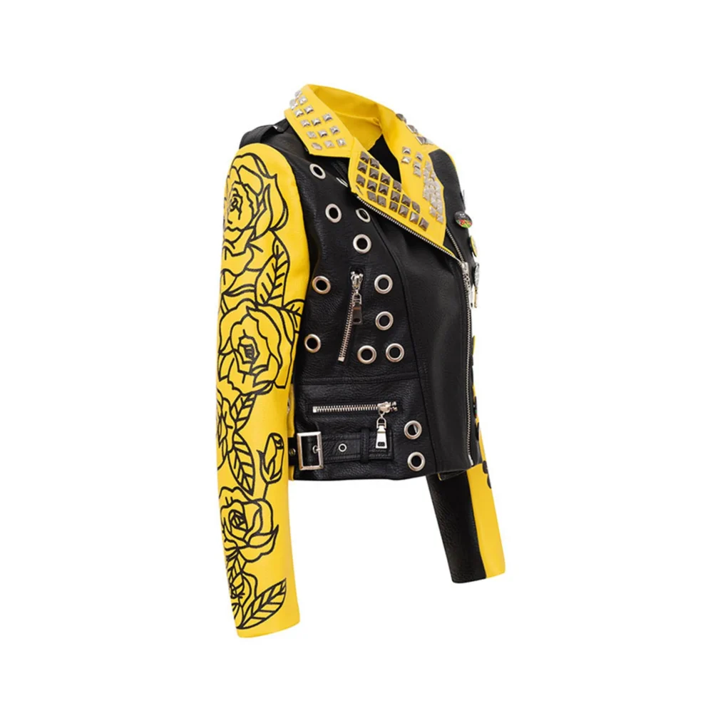 Right side view of a yellow and black moto jacket with patches and zipper closure.