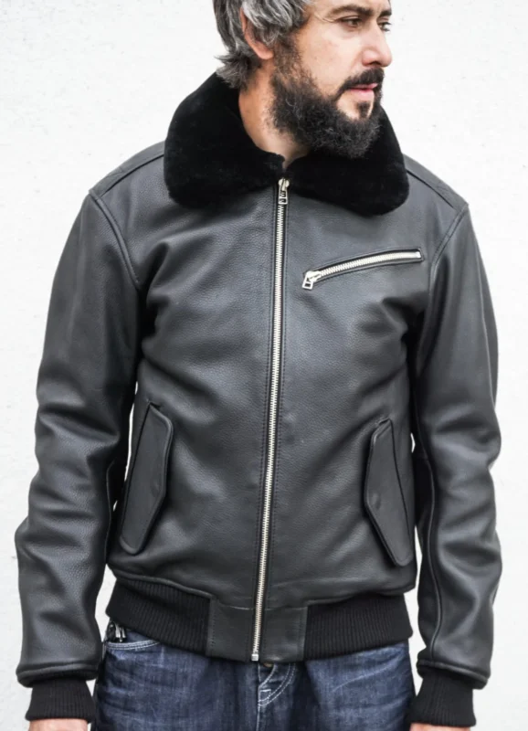 Men's aviator leather jacket with detachable fur collar, zipper closure, and multiple pockets.