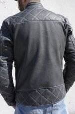 Back view of a black cafe racer leather jacket, showcasing the removable protectors and unique design.