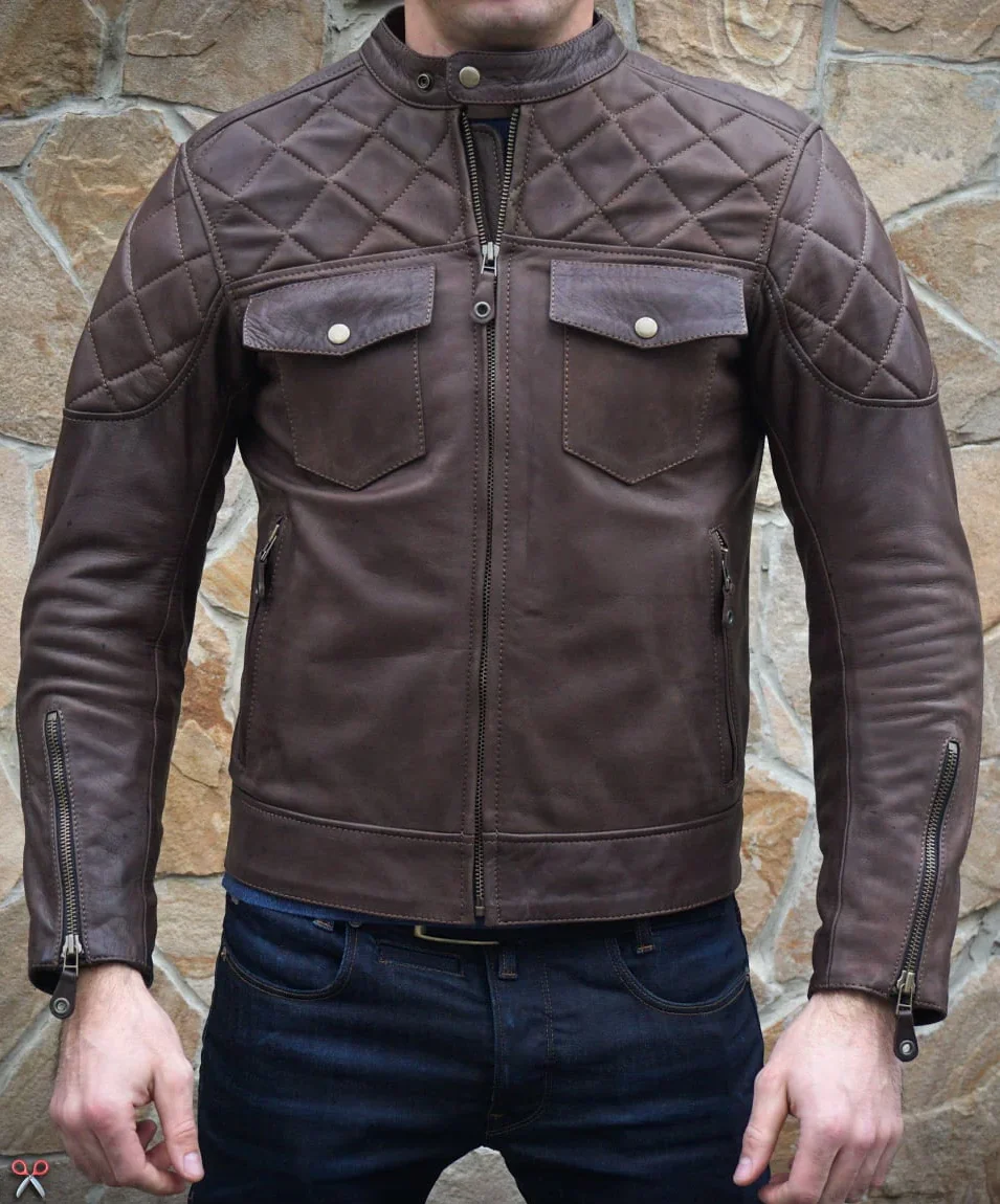 Brown cafe racer leather jacket with quilted shoulders, front zipper closure, and model wearing it.