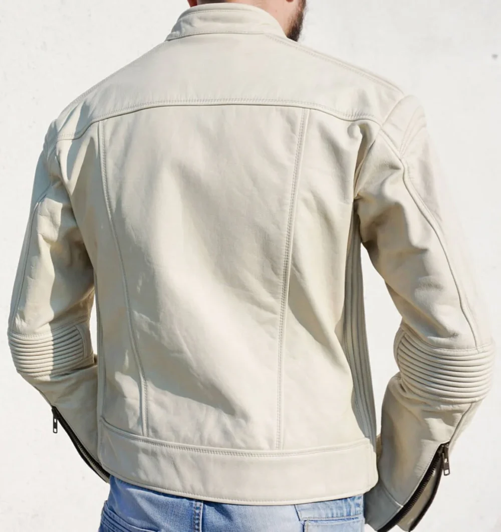 Back view of a cream leather racer jacket with a bi-swing back and zippered cuffs.