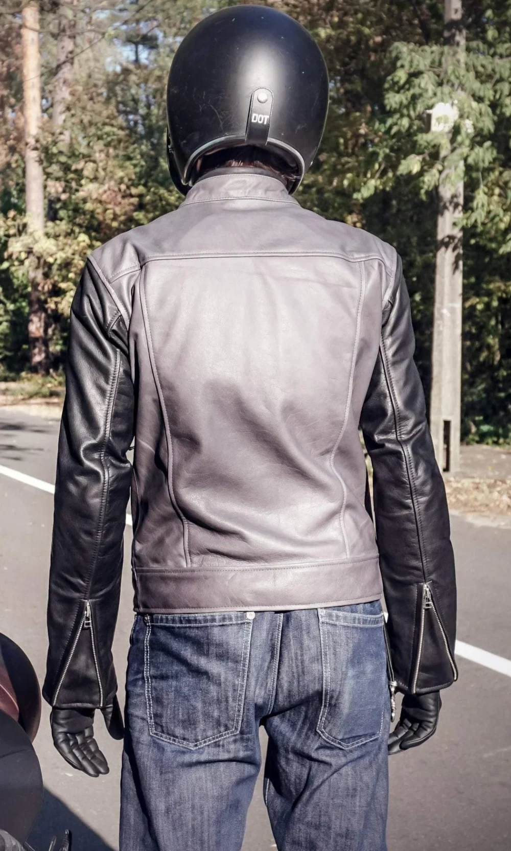 Back view of the handcrafted men's slim fit leather jacket, highlighting the ergonomic cut and design.