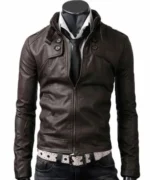 Close-up of a dark brown leather jacket with a buckled stand-up collar and open top-up closure.