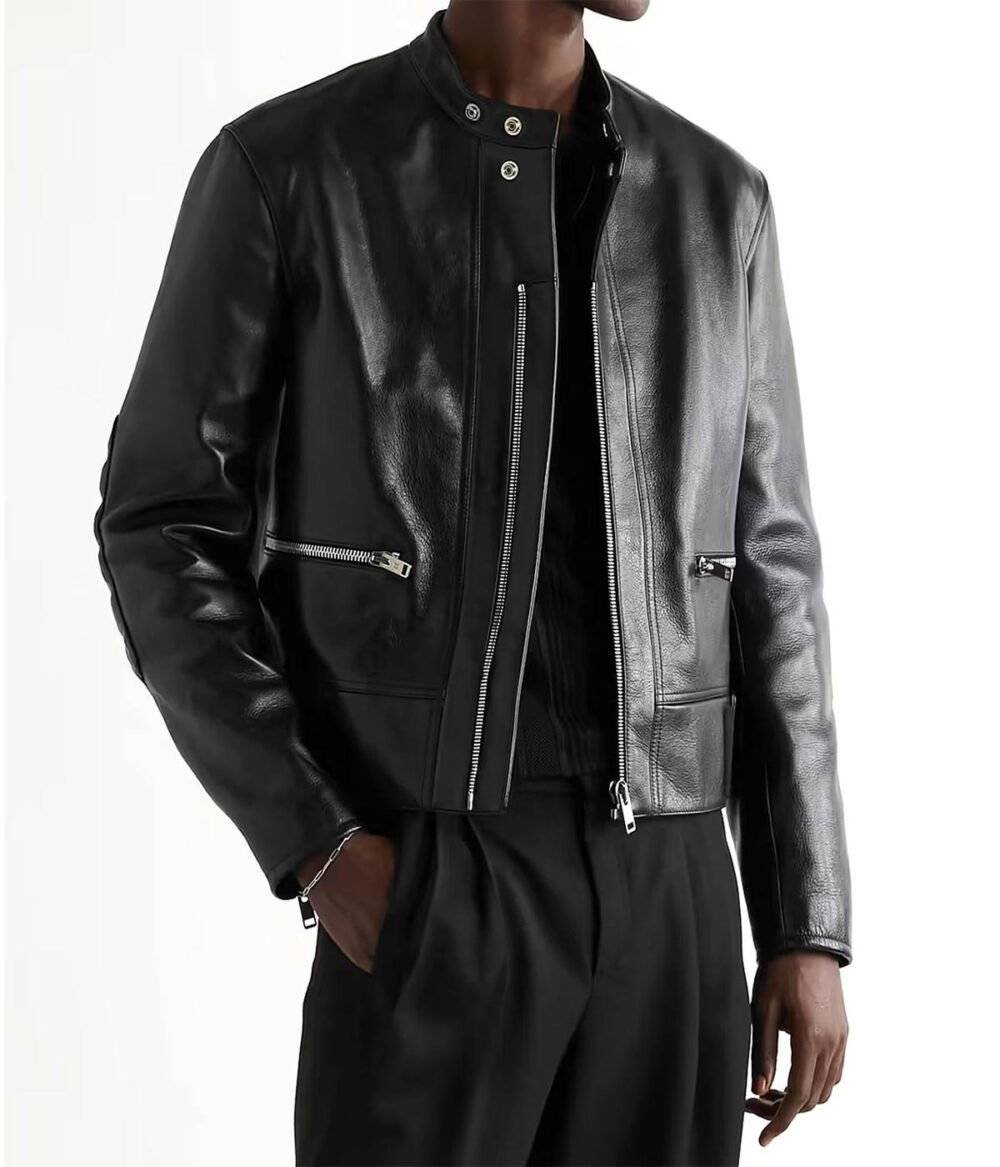 Slim fit black leather jacket with snap tab collar, YKK zipper closure, and full-length sleeves.