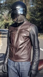 Men's café racer leather jacket with Dainese armor protectors and a sleek, ergonomic cut.