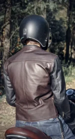 Back view of a men's café racer leather jacket, showcasing the ergonomic cut and zippered pockets.