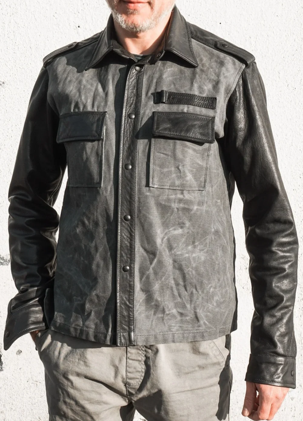 Men's black shirt jacket made of hand-waxed canvas and genuine leather.