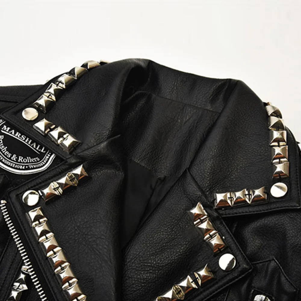 Close-up of the studded lapel collar on the black punk style leather jacket.