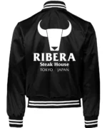 Back of Ribera Steakhouse satin jacket with rib-knit details.