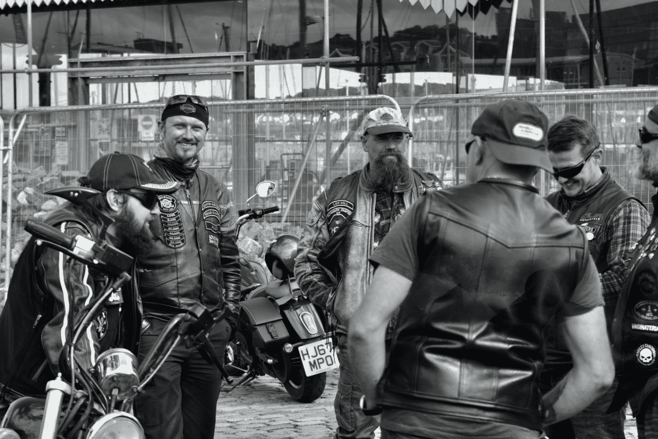 How to Wear a Biker Jacket in 2024: Style Guide and Trends 2 Bikers wearing Harley-Davidson Jacket