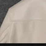 Close-up of White Slim Fit PU Jacket fabric