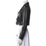 Side view of a women's leather biker jacket highlighting its cropped cut and belted detail.