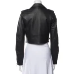 Back view of a women's cropped leather biker jacket with a belted waist.